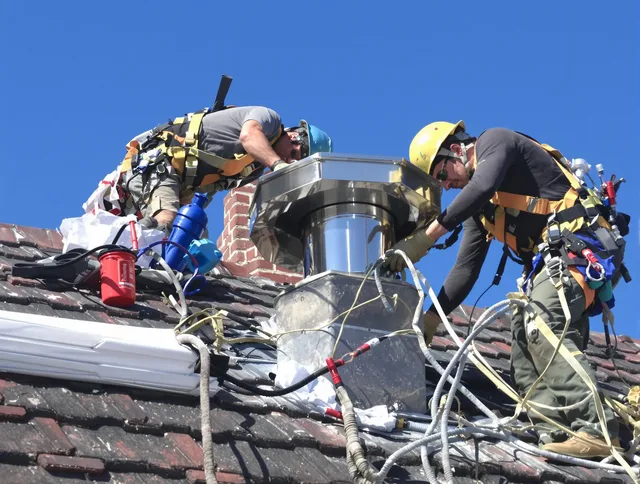Protective chimney cap installed by Norwell Chimney Sweep in Norwell, MA