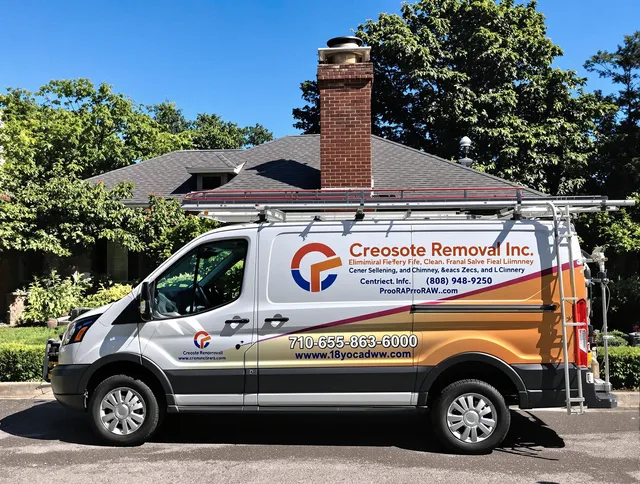 Norwell Chimney Sweep technician removing creosote safely in Norwell, MA