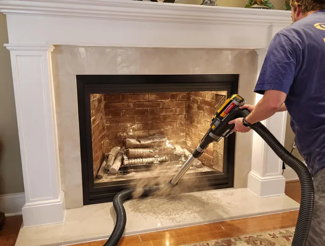Fireplace cleaning performed by Norwell Chimney Sweep in Norwell, MA