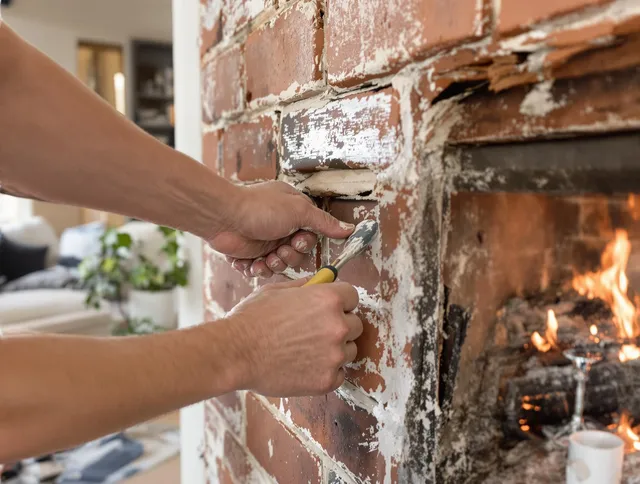 Routine fireplace repair by Norwell Chimney Sweep in Norwell, MA